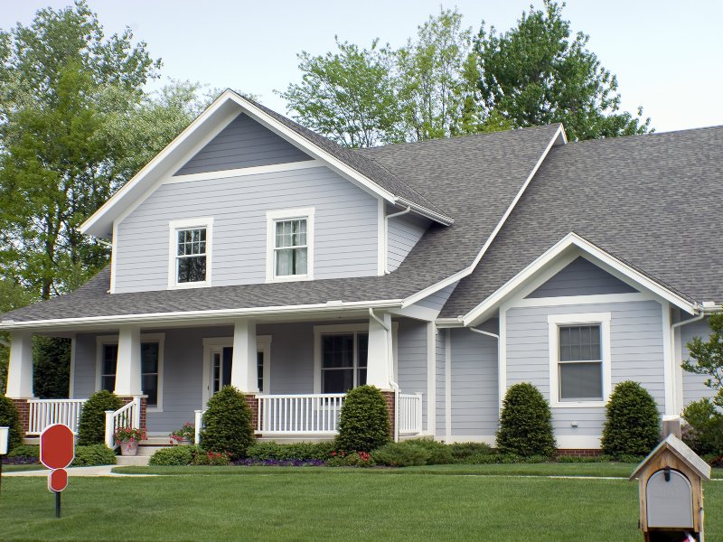 light gray home with clean roof